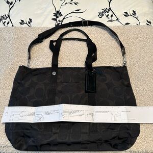 Coach Signature extra large overnight bag.